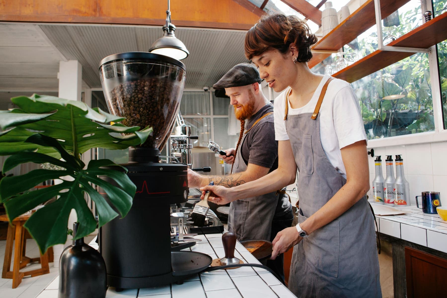 Baristas in trendy cafe